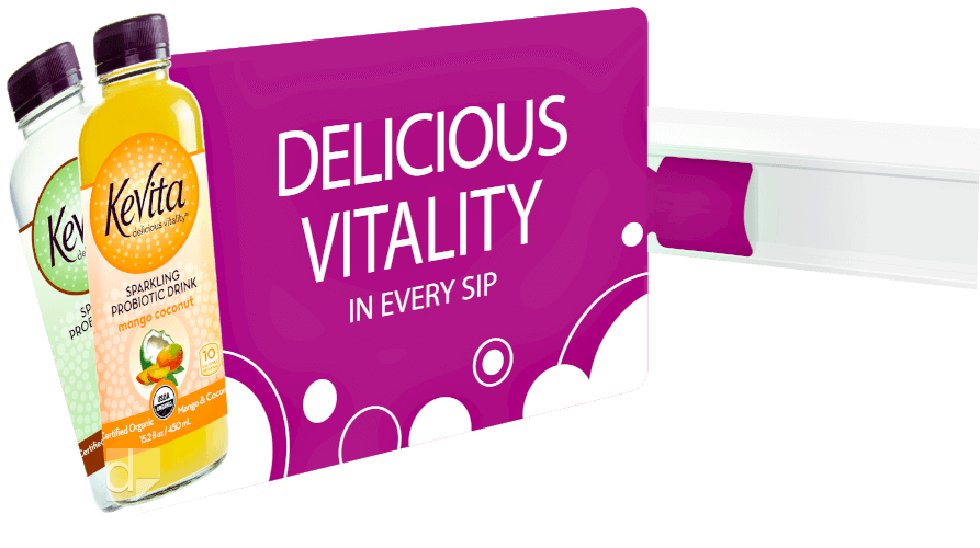 Picture of a double-sided aisle violator printed by Dilco; and an image showing what it looks like when attached to the shelf of a store.
